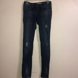 Distressed blue jean